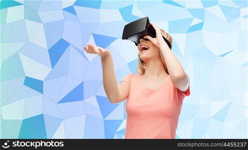 technology, virtual reality, entertainment and people concept - happy young woman with virtual reality headset or 3d glasses over blue low poly texture background