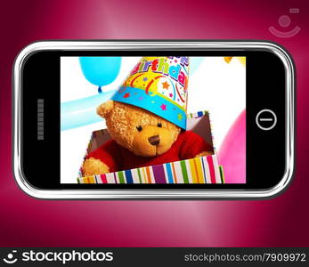 Teddy Bear Birthday Gift Photo On Smartphone. Teddy Bear Birthday Gift Photo On A Smartphone