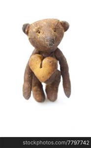 teddy bear handmade and cookie in the form of heart isolated on white