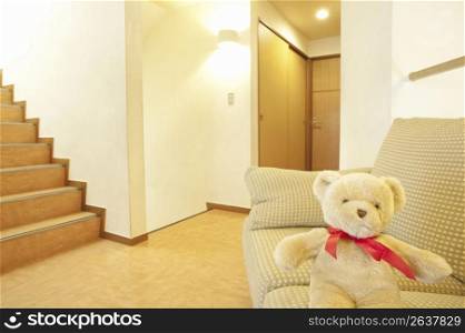 Teddy bear on a sofa