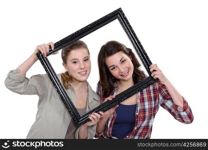 Teen behind black frame