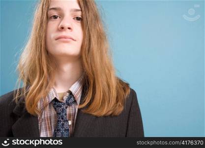 Teen Boy in Ill-fitting Suit