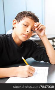 Teen boy worried about taking a standardized test.