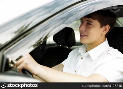 teen driver with white shirt, selective focus on nearest eye