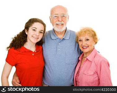 Teen girl and her senior grandparents. Isolated on white.
