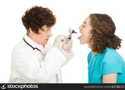 Teen girl being examined by a female doctor. Isolated on white.