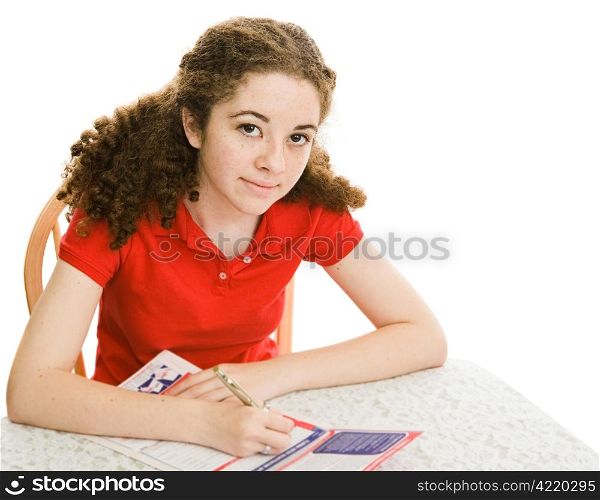 Teen girl filling out mail-in voter registration form. Shallow depth of field with focus on the girl&rsquo;s face. Isolated on white.