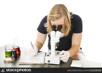 Teen girl in school science lab doing research. Isolated on white.