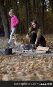 teen girl on picnic in the autumn forest