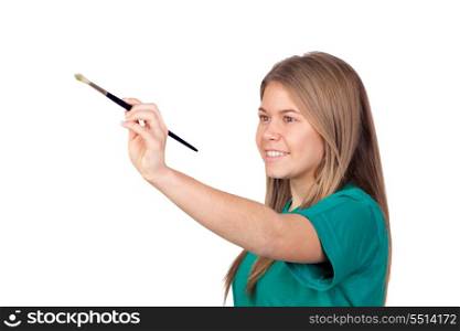 Teen girl painting something with a brush isolated with white background