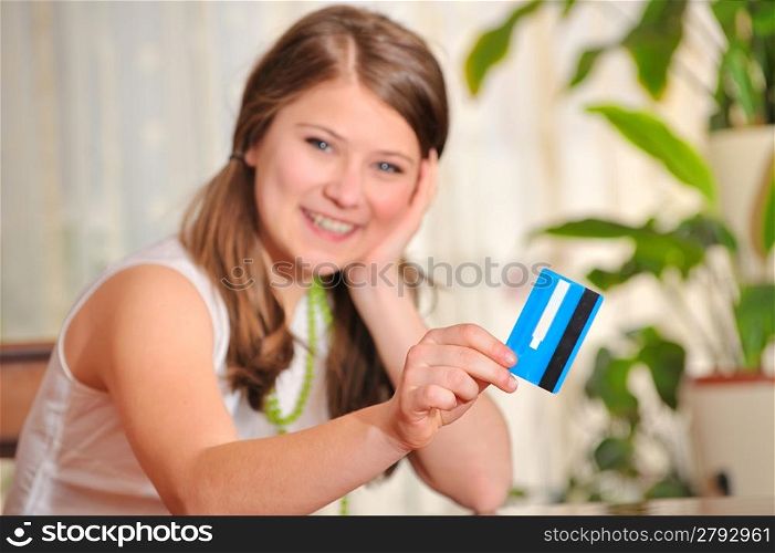 teen girl with blank credit card
