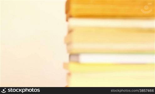 Teen girl with lot of books reading