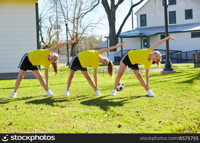 Teen girls group exercise workout at park