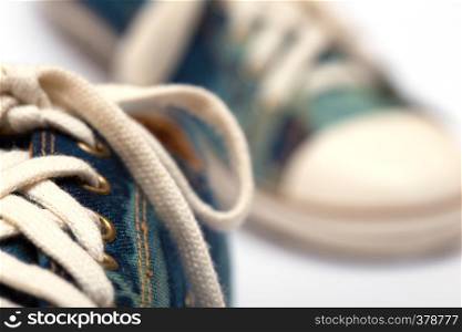 teen jeans sneakers isolated on a white