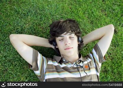 Teen lying on the grass