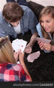 Teen playing cards