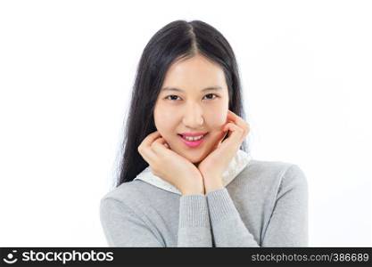 Teenage Asian high school girl with hands on chin