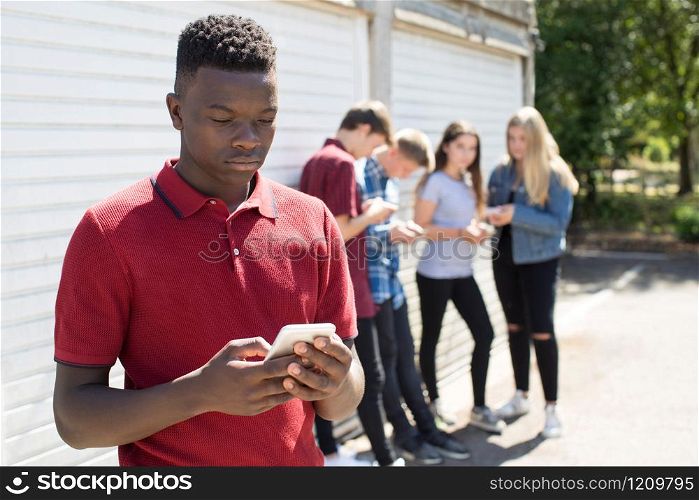 Teenage Boy Being Bullied By Text Message