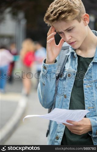 Teenage Boy Disappointed With Exam Results