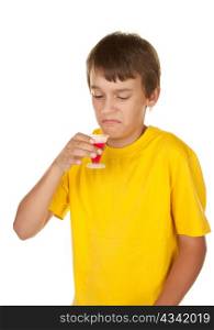 teenage boy drinking disgusing cherry medicine