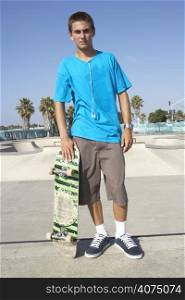 Teenage Boy In Skateboard Park
