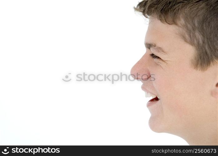Teenage boy laughing