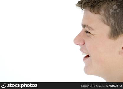 Teenage boy laughing