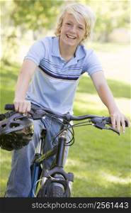 Teenage Boy On Bicycle
