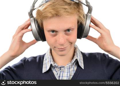 Teenage boy smiling with headphones listening to music isolated