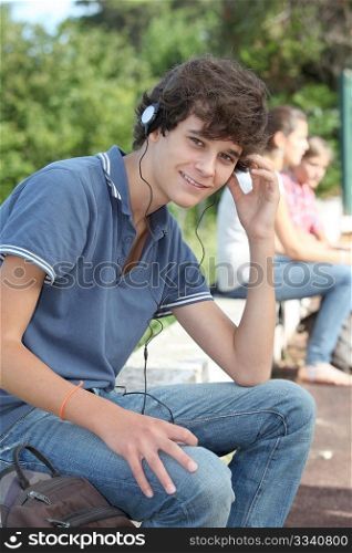 Teenage boy with headphones on