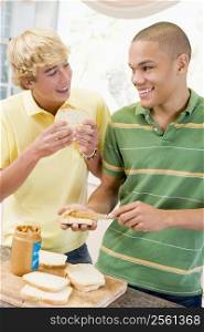 Teenage Boys Making Sandwiches
