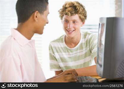 Teenage Boys Using Desktop Computer
