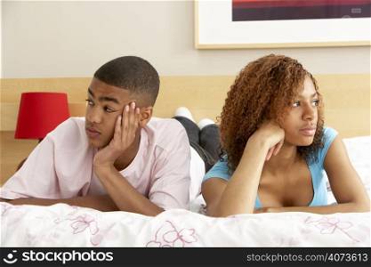 Teenage Couple After Arguement In Bedroom