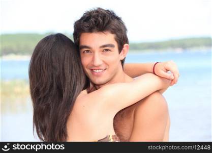 teenage couple at beach