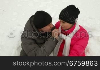 Teenage Couple Enjoying in Snow and Winter