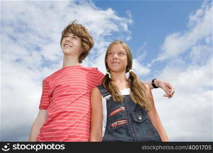 Teenage couple looking up
