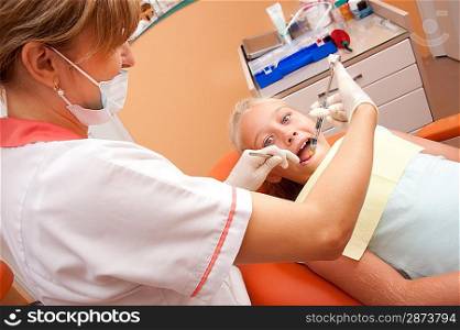 Teenage girl at a dentist.