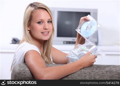 Teenage girl at home with Cd&rsquo;s