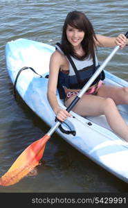 teenage girl doing canoe