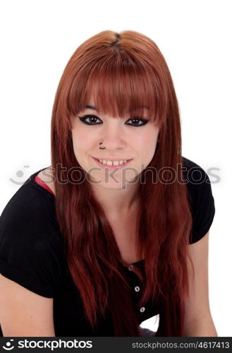 Teenage girl dressed in black with a piercing looking at camera isolated on white background