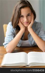 Teenage girl enjoy reading book student at home