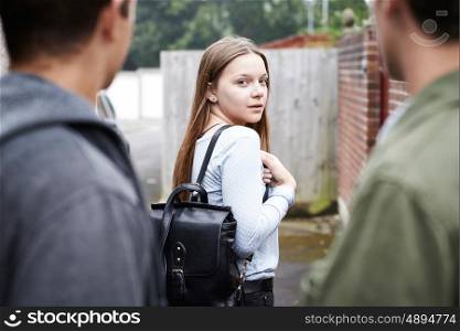 Teenage Girl Feeling Intimidated As She Walks Home