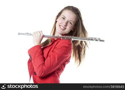 teenage girl holds flute in studio with white background