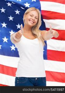 teenage girl in blank white t-shirt with thumbs up and american flag
