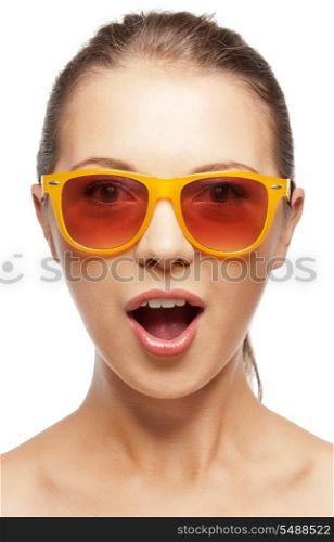 teenage girl in shades with expression of surprise