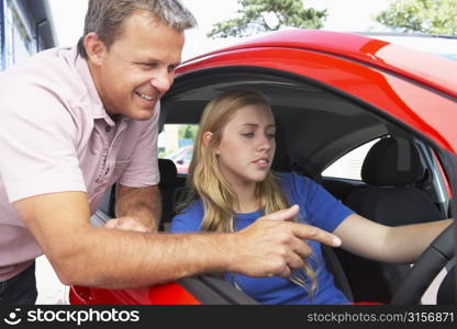 Teenage Girl Learning How To Drive