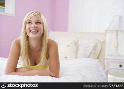 Teenage Girl Lying On Bed