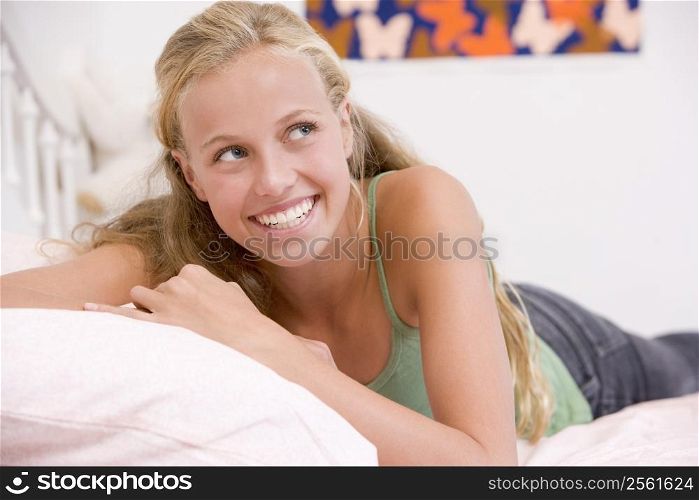 Teenage Girl Lying On Her Bed