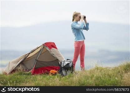 Teenage Girl On Camping Trip In Countryside