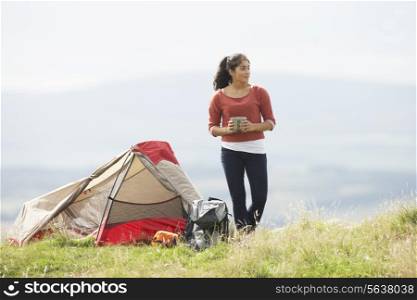 Teenage Girl On Camping Trip In Countryside